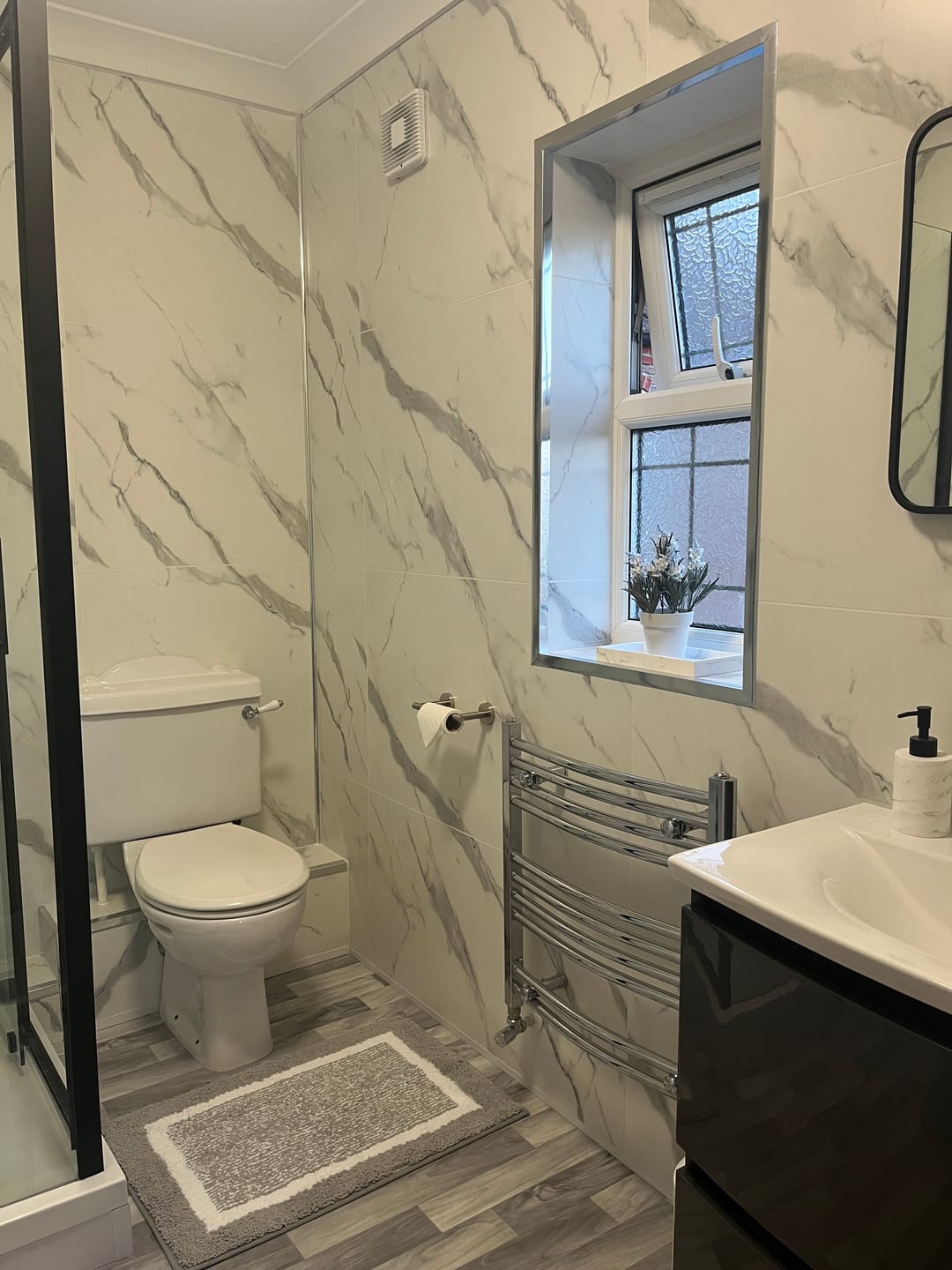 Customer photo review of 10mm Large Tile Carrara Marble Matt Shower Panel 1M x 2.4M