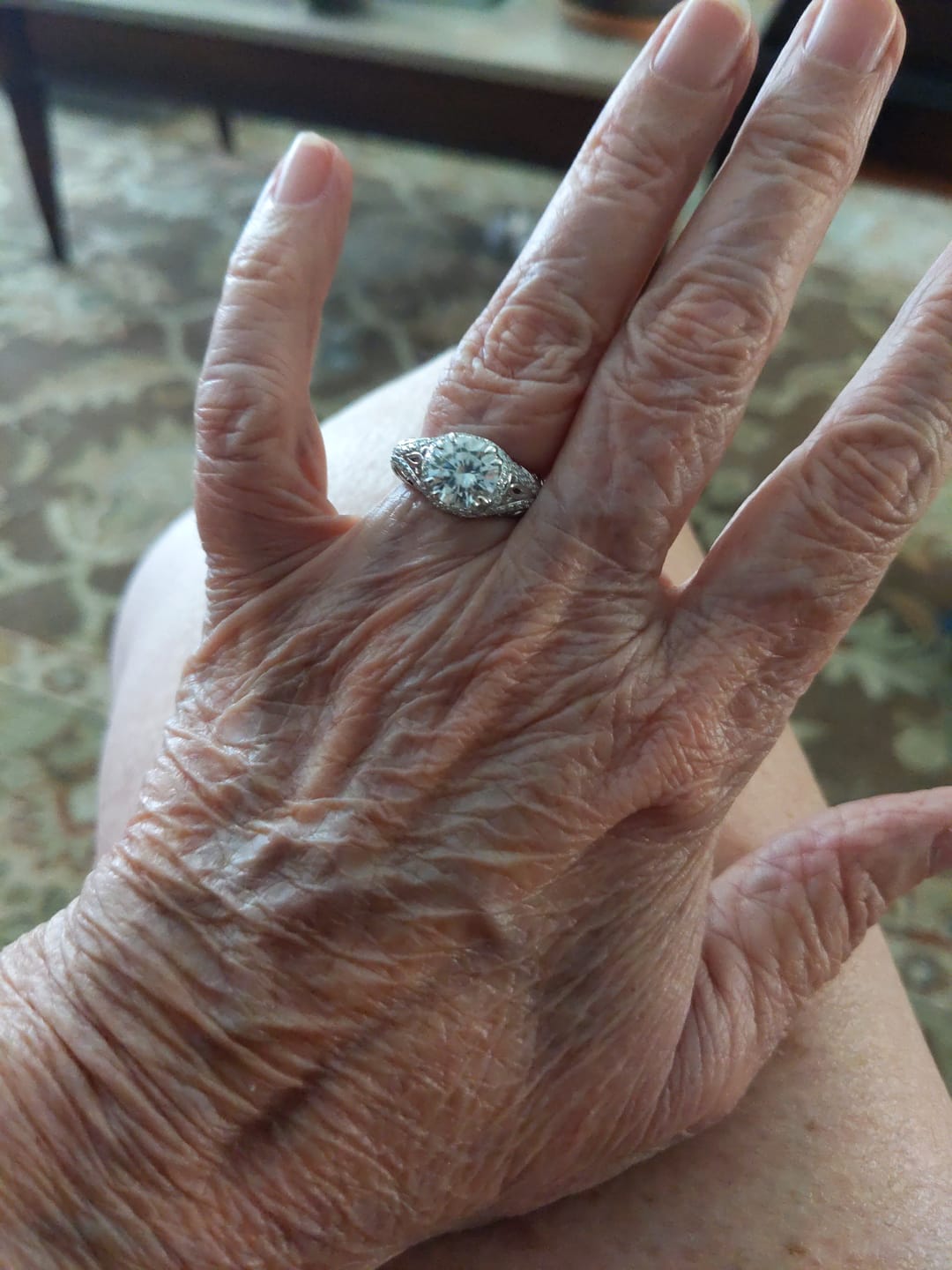 Customer photo review of Vintage Moissanite Pave Open Scroll Accents Engagement Ring