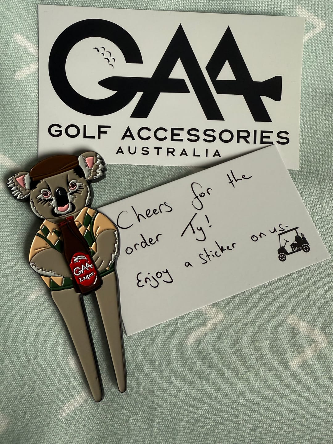 Customer photo review of Golfing Koala divot tool + ball marker & hat clip