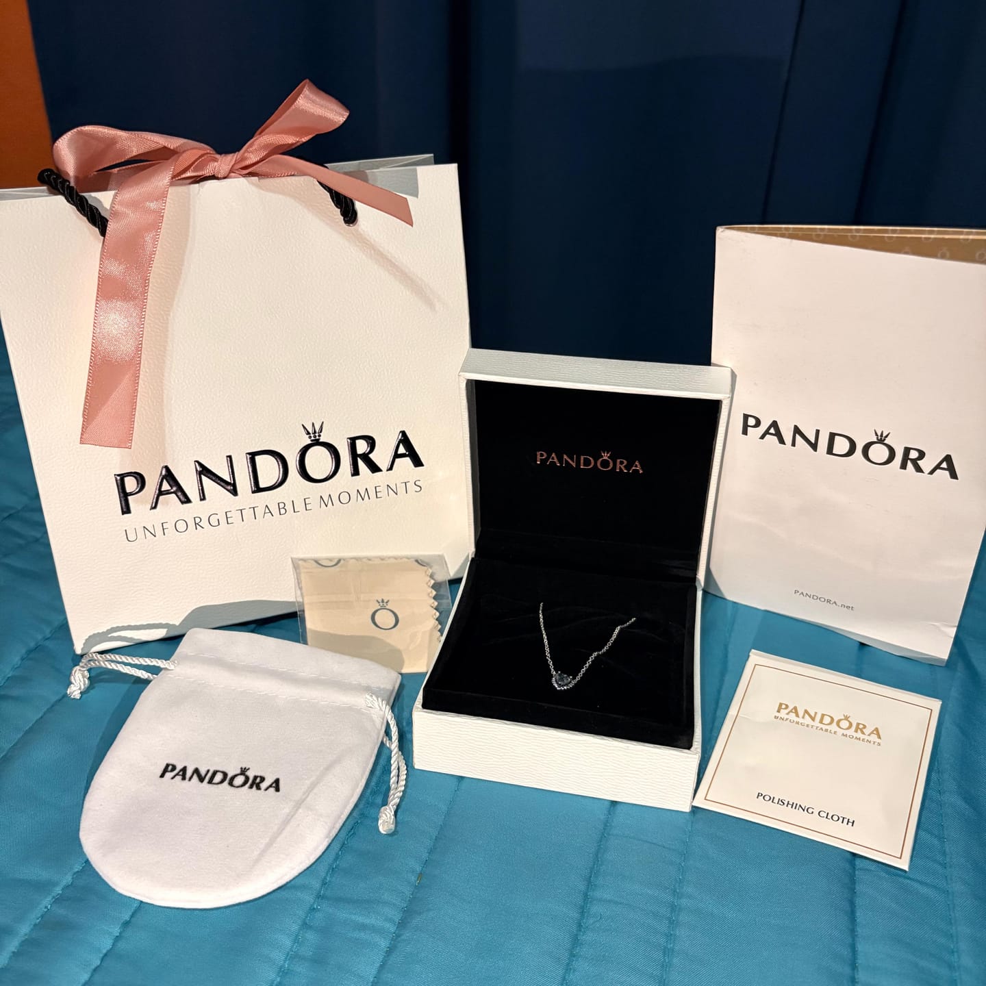 Customer photo review of COLLAR PANDORA CORAZON ELEVADO AZUL + KIT DE REGALO