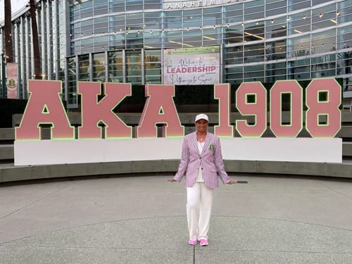 Customer photo review of AKA Pink and Green Striped Blazer