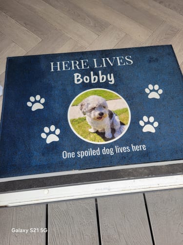 Customer photo review of Here lives - Personalised doormat