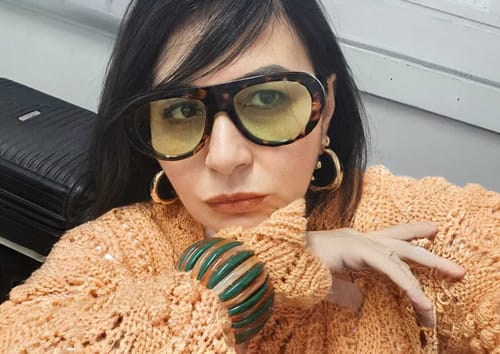 Customer photo review of Óculos Milano