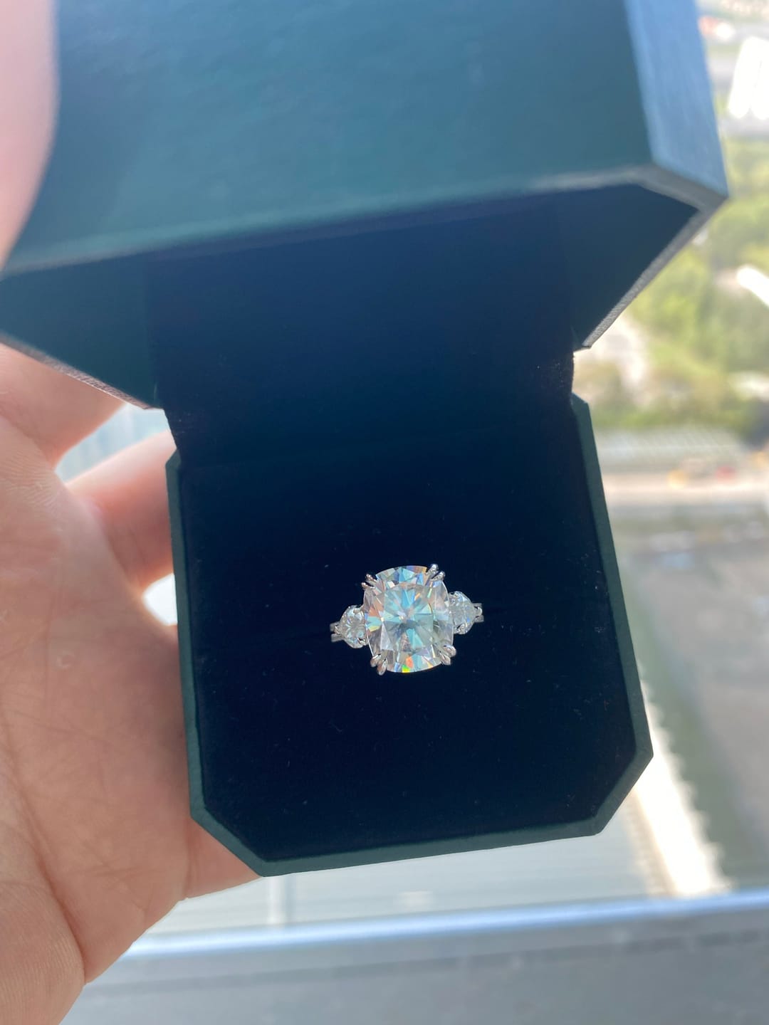 Customer photo review of Moissanite 6.0Ct Cushion Cut Three Stone Engagement Ring In Sterling Silver