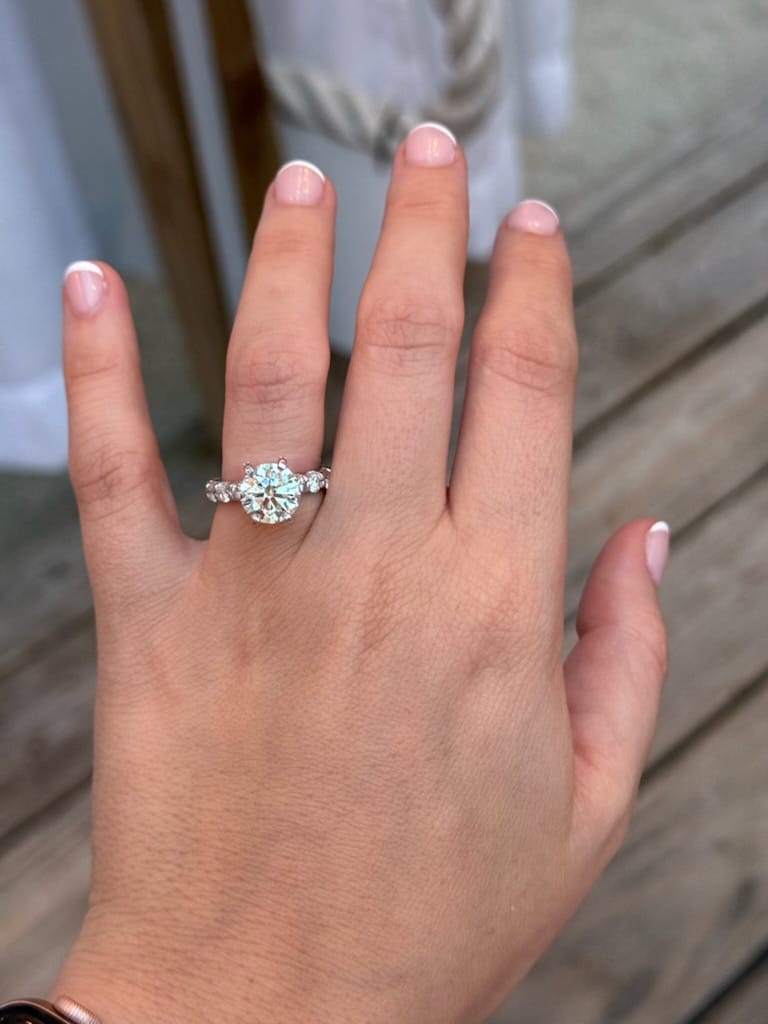 Customer photo review of Custom Ring as discussed Total 6.5 carats, center 3 carats F VS1 and smaller diamonds F VVS1, all natural earth mined diamonds, Size 5.5, White Gold 14K
