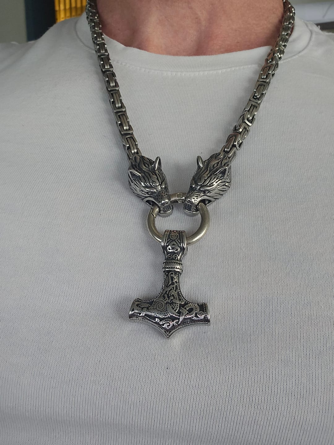 Customer photo review of Viking Wolf Head Necklace with Thor's Hammer Pendant