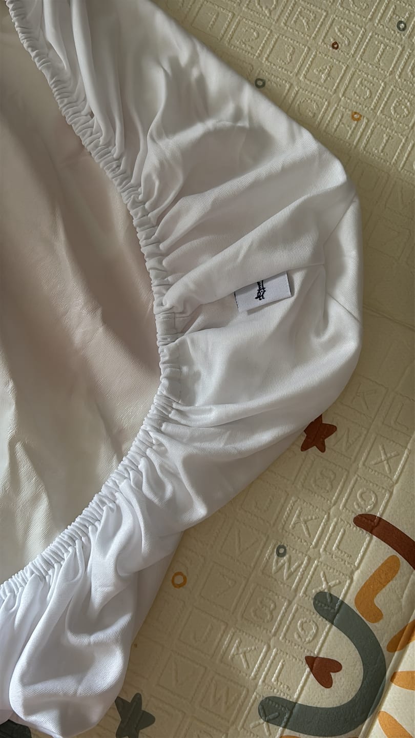 Customer photo review of Protège matelas imperméable pour lit bébé