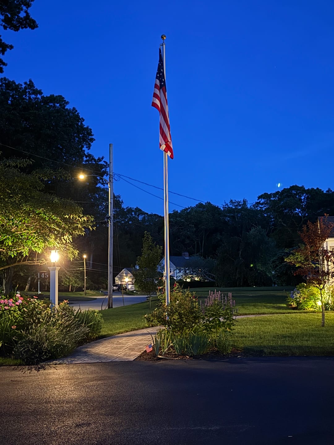 Customer photo review of 20 ft. Commercial Aluminum Flagpole with External Rope Halyard rated at 85 mph