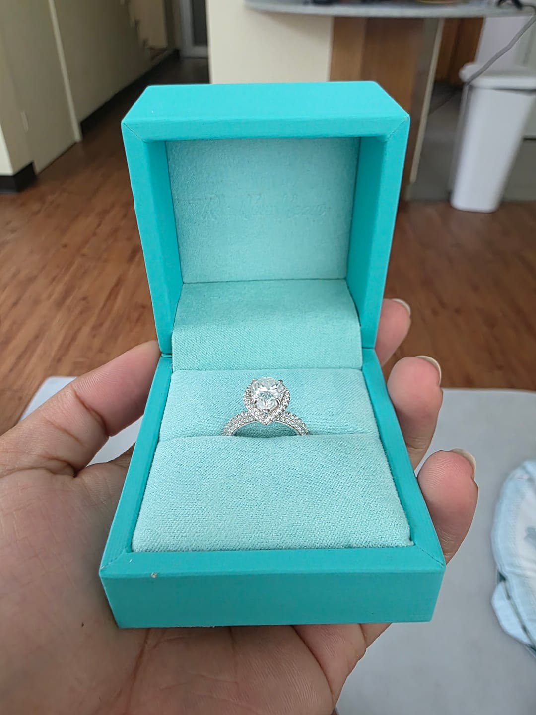 Customer photo review of Halo Pear Moissanite Triple Row Pave Engagement Ring