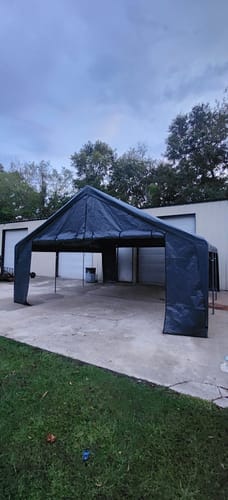 Customer photo review of REIBII 20x20 Heavy-Duty Carports for Two Car, Portable Carport Garage with 4 Windows and 3 Roll-up Doors, Waterproof Carport Canopy Protection UV50+