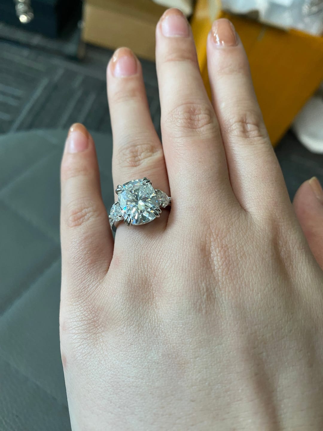 Customer photo review of Moissanite 6.0Ct Cushion Cut Three Stone Engagement Ring In Sterling Silver