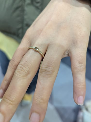Customer photo review of Blue Topaz Bezel Ring in 9ct Yellow Gold