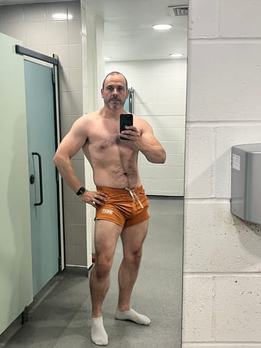 Customer photo review of SQUATTING SHORTS – RETRO / AMBER ORANGE