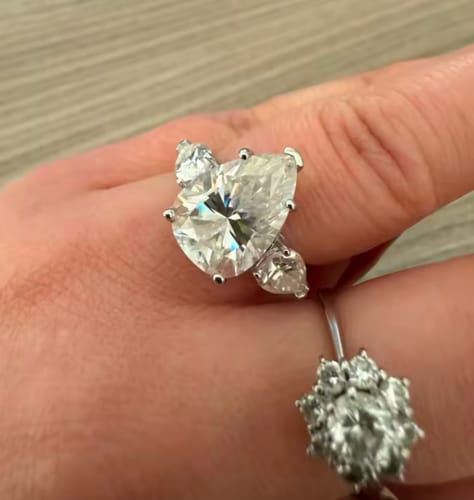 Customer photo review of Elysia 8 Carat Pear Cut Moissanite Gold Plated Silver Ring