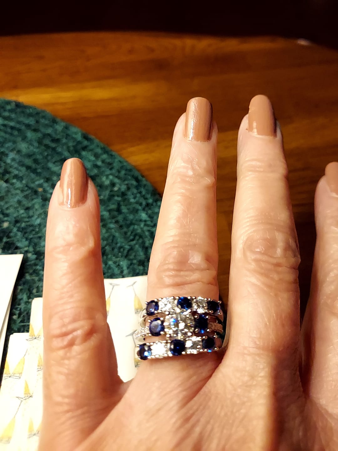 Customer photo review of Five Stone Moissanite and Sapphire Wedding Band Ring In Sterling Silver