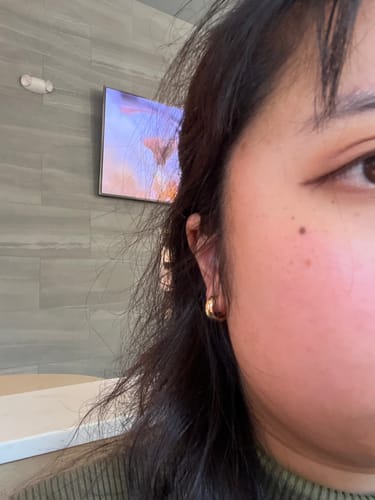 Customer photo review of Simple Huggie Clip On Earrings in Gold