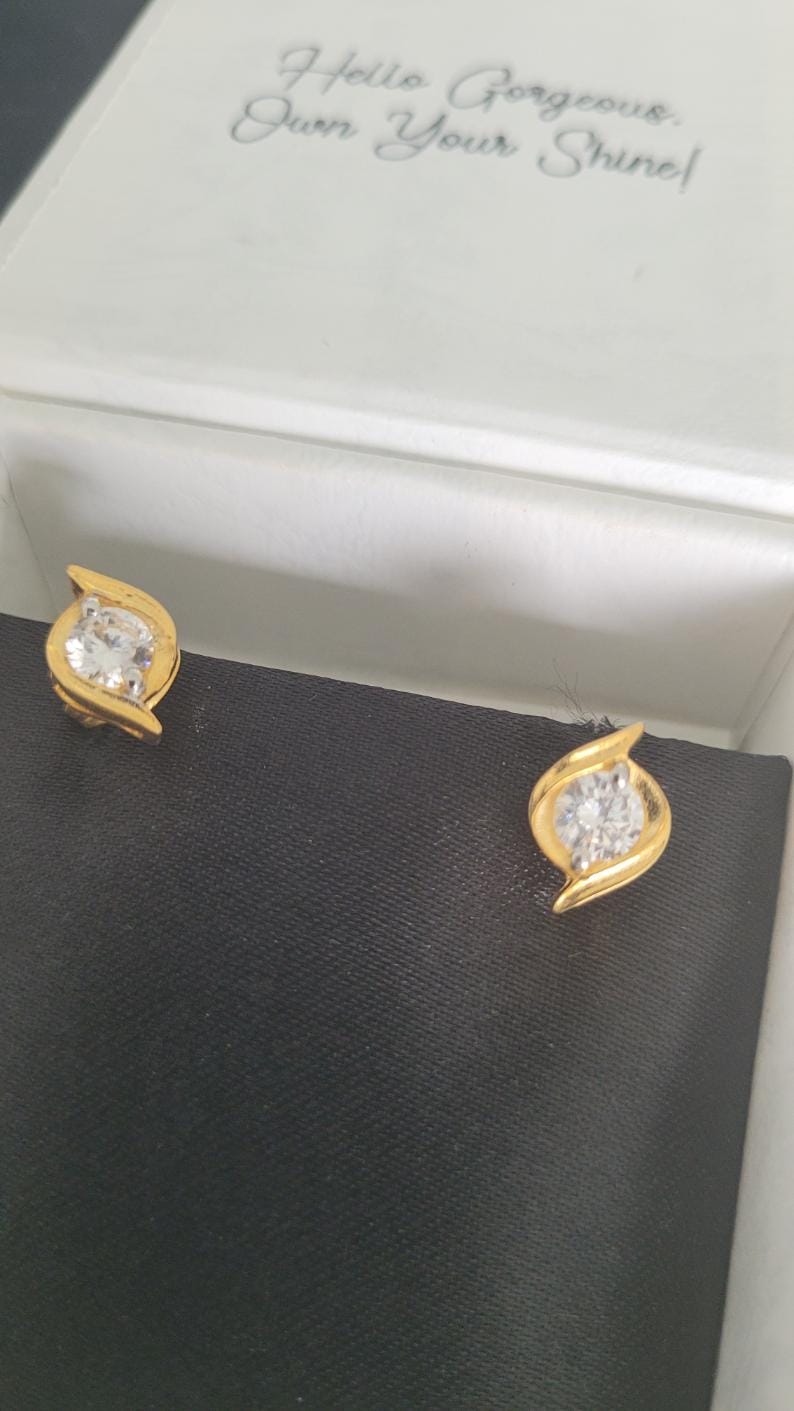 Customer photo review of Sparkle Eye Studs in 92.5 Sterling Silver