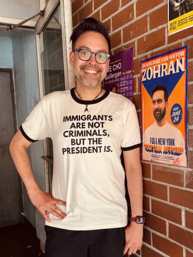 Customer photo review of Immigrants Premium Unisex T-Shirt