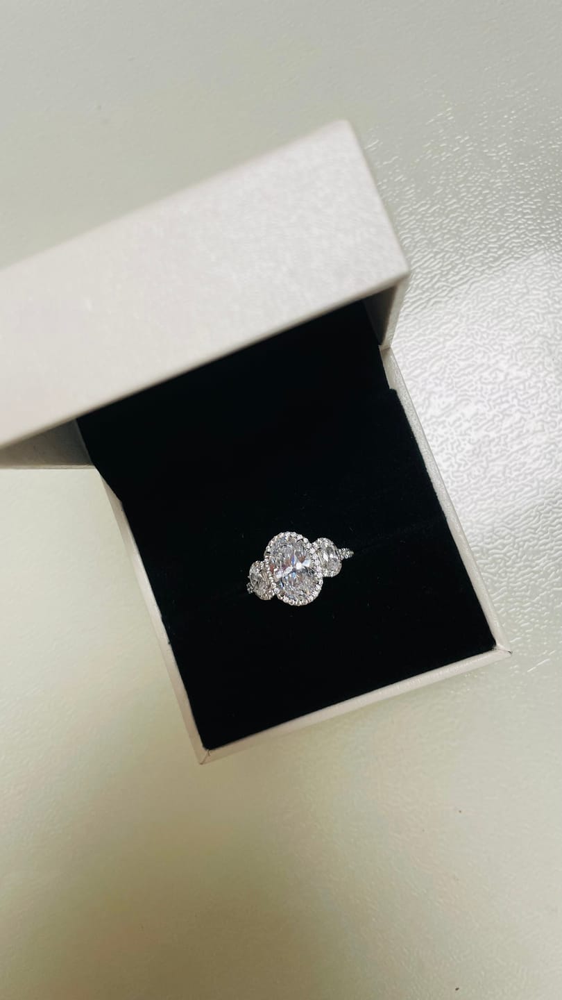 Customer photo review of 2.5Ct Halo Oval Cut Three Stone Engagement Ring Travel Ring In Sterling Silver