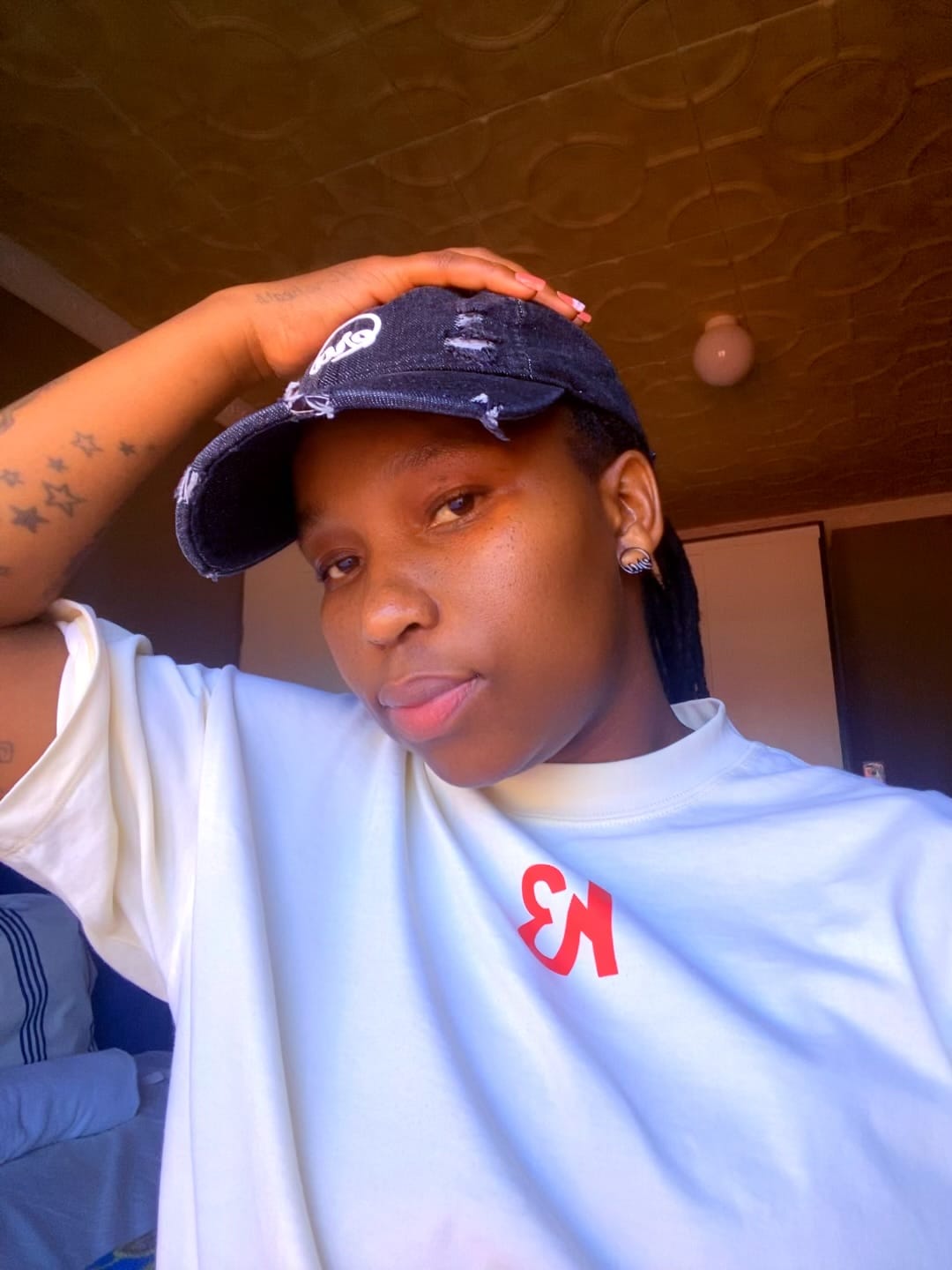Customer photo review of Era Distressed Black Denim Cap