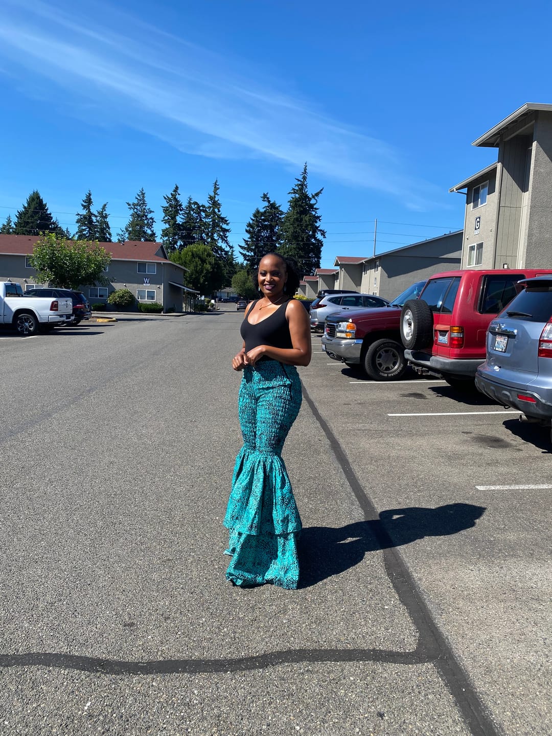 Customer photo review of Kimi Women's African Print Bell Bottom Pants - Blue