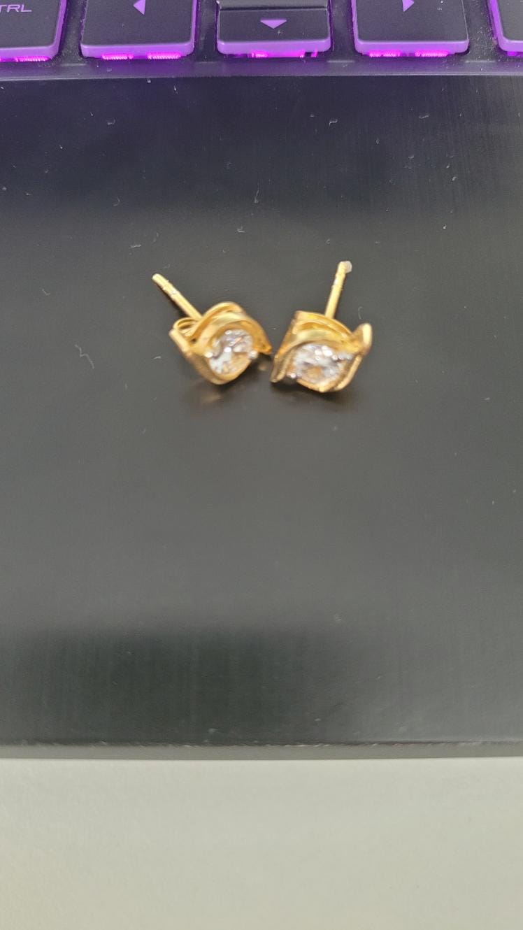 Customer photo review of Sparkle Eye Studs in 92.5 Sterling Silver