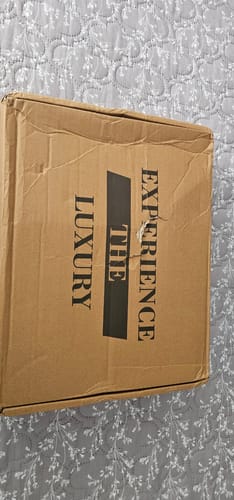 Customer photo: The box it arrived in, worn by Rimon O.
