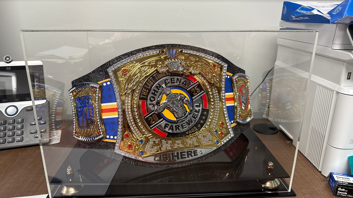 Customer photo review of Clear Acrylic Wrestling Belt Display Case (A014)