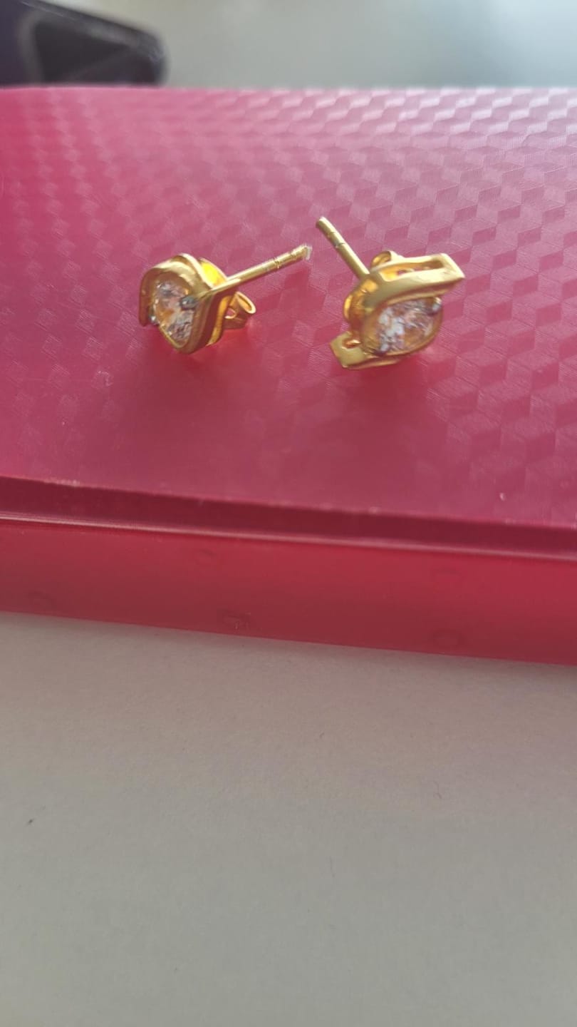 Customer photo review of Sparkle Eye Studs in 92.5 Sterling Silver