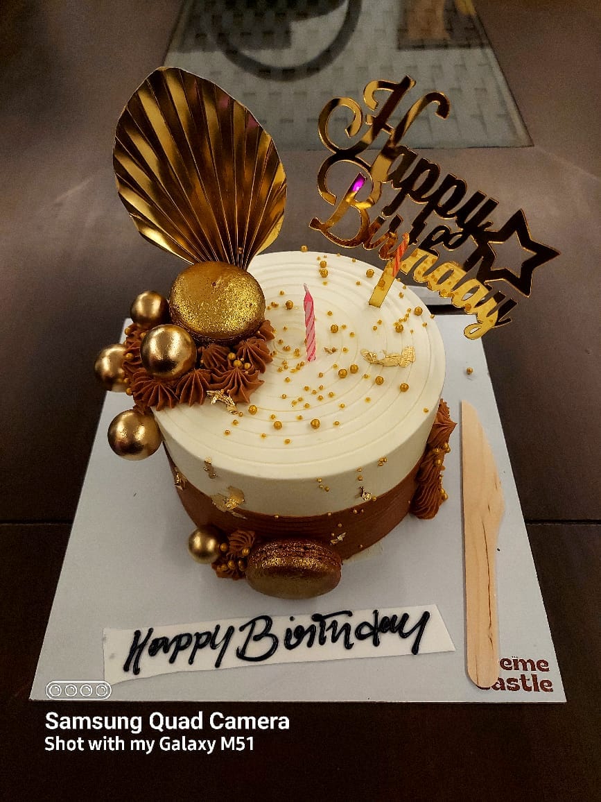 Customer photo review of Golden cake for boyfriend birthday