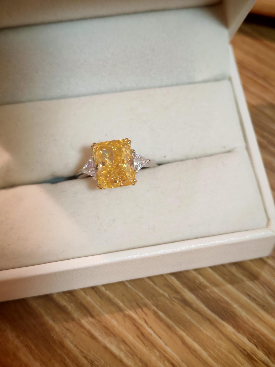 Customer photo review of S925 4.0Ct Radiant & Triangle Cut Yellow Stone Three Stone Engagement Ring In Sterling Silver
