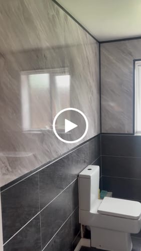Customer video review of Premium Grey Stone Marble Gloss Shower Wall Panel - 1M x 2.4M