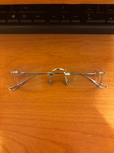 Customer photo review of Sylus Sliver Rimless Men Blue Prescription Glasses