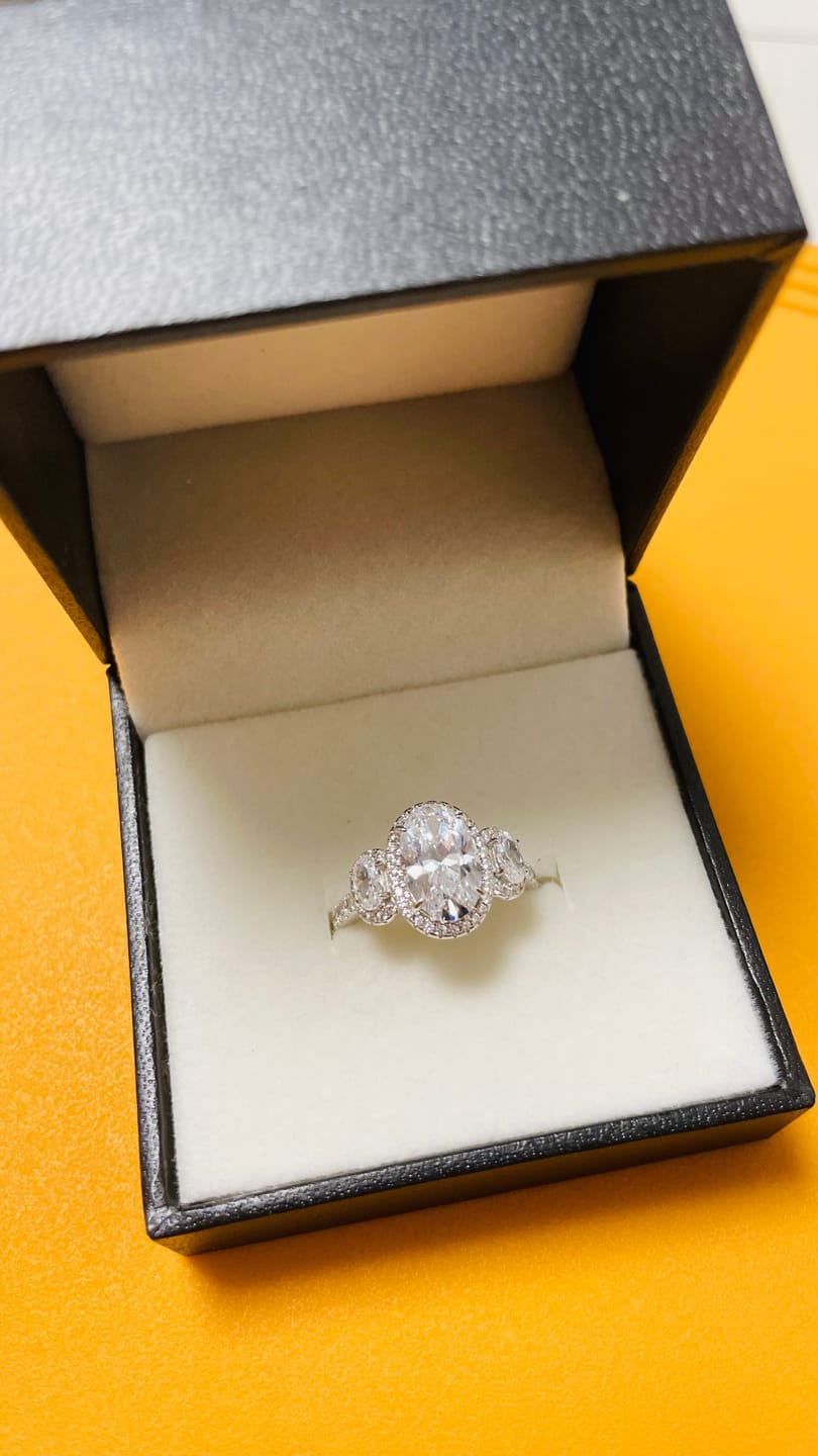 Customer photo review of 2.5Ct Halo Oval Cut Three Stone Engagement Ring Travel Ring In Sterling Silver