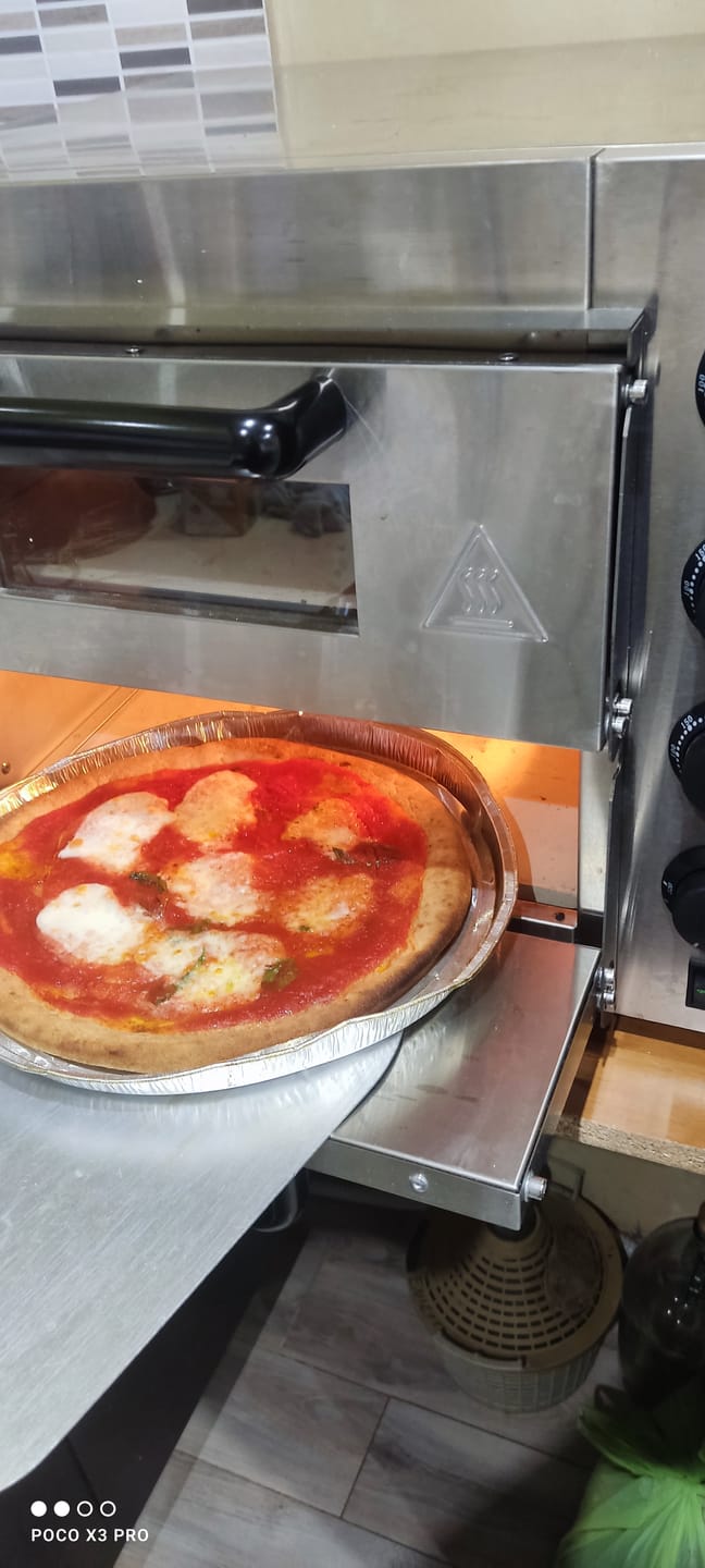 Customer photo review of Pizza Senza Glutine