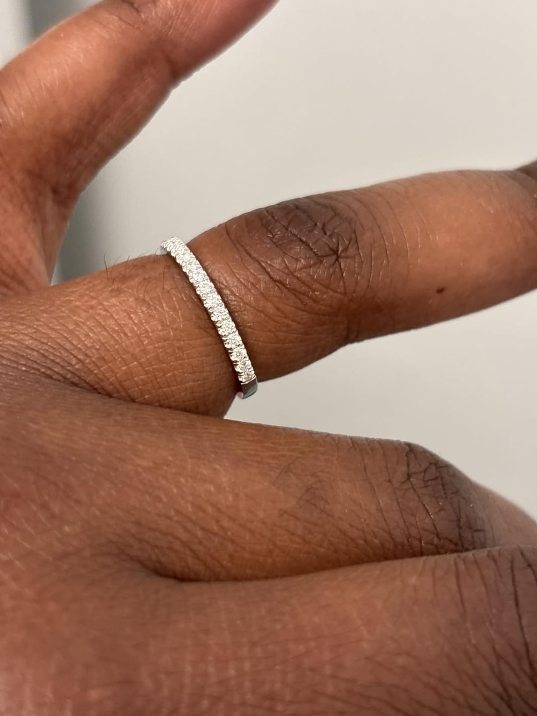 Customer photo review of S925 Half Halo Moissanite 0.5 Ct Round Cut White/Green Stone Anniversary Ring