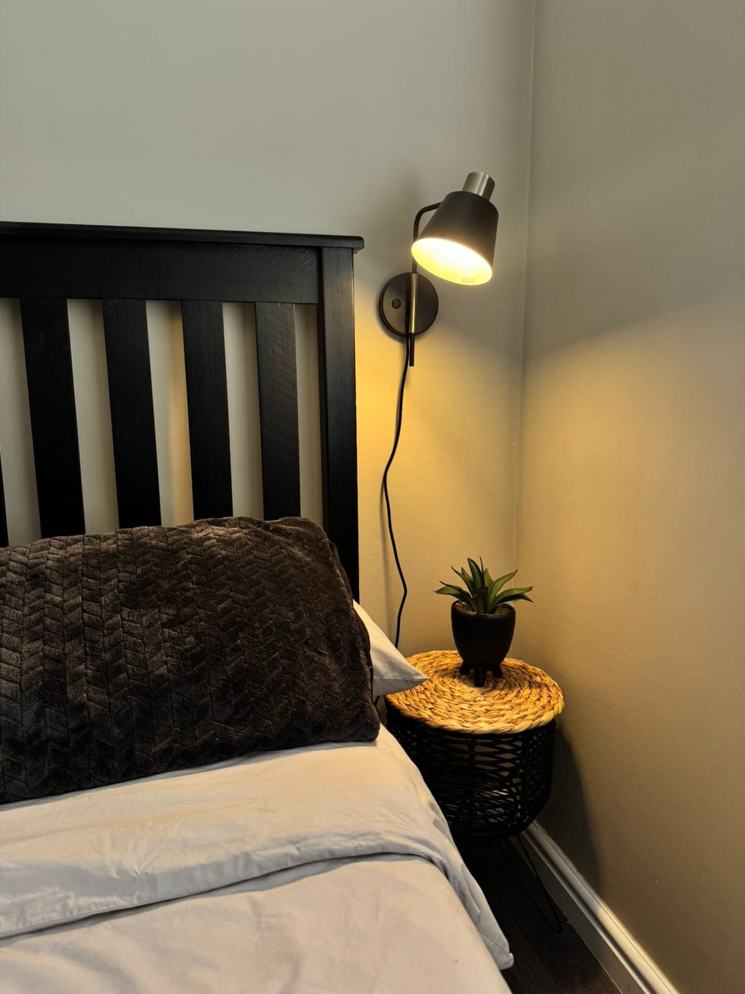 Customer photo review of Cromwell Black And Antique Brass Wall Light with Cord and Plug