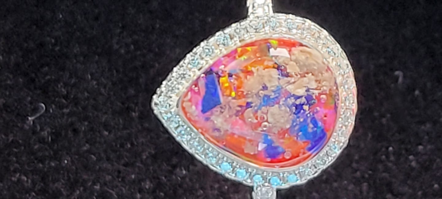 Customer photo review of Bedazzled Pear Opal Ring with Cremation Ashes