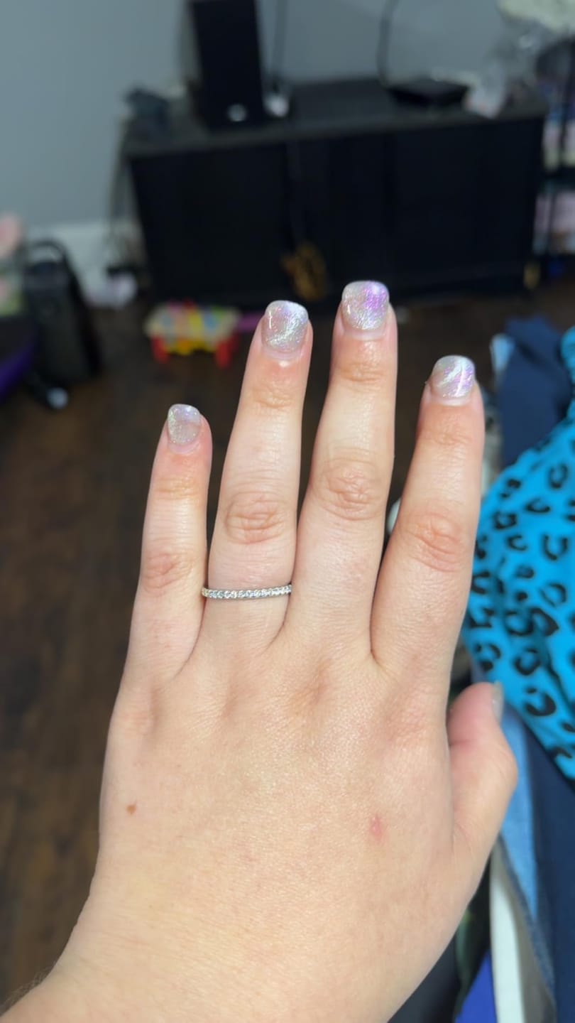 Customer photo review of S925 Half Halo Moissanite 0.5 Ct Round Cut White/Green Stone Anniversary Ring