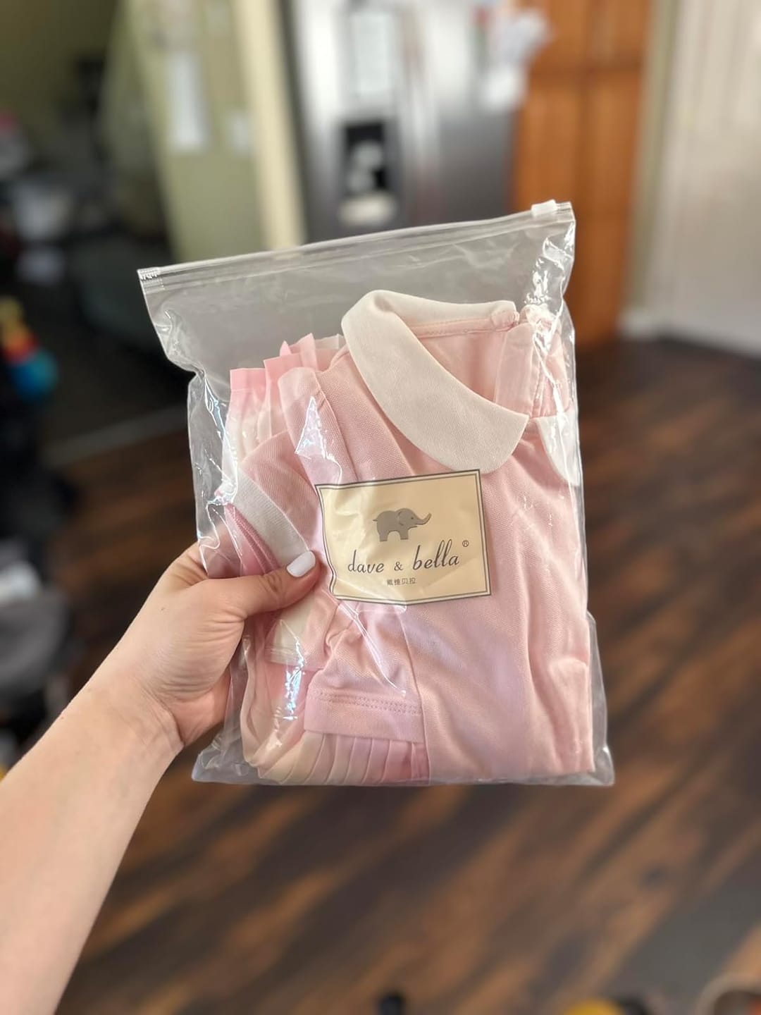 Customer photo review of Dave&Bella Baby Girls Summer Short Sleeve Pink Pleated Dress