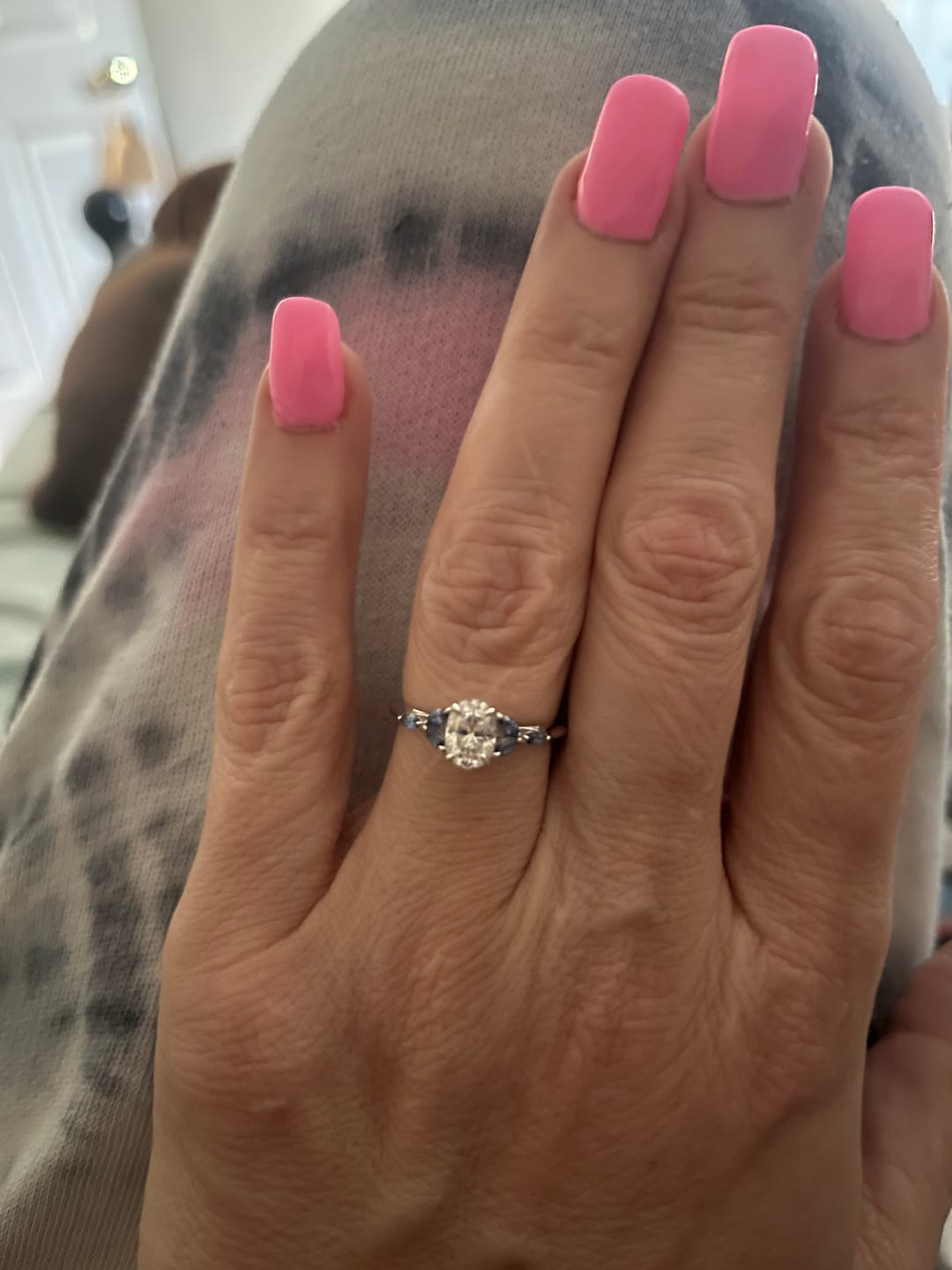 Customer photo review of Oval Cut Moissanite With Marquise Sapphire Petals Accents Engagement Ring