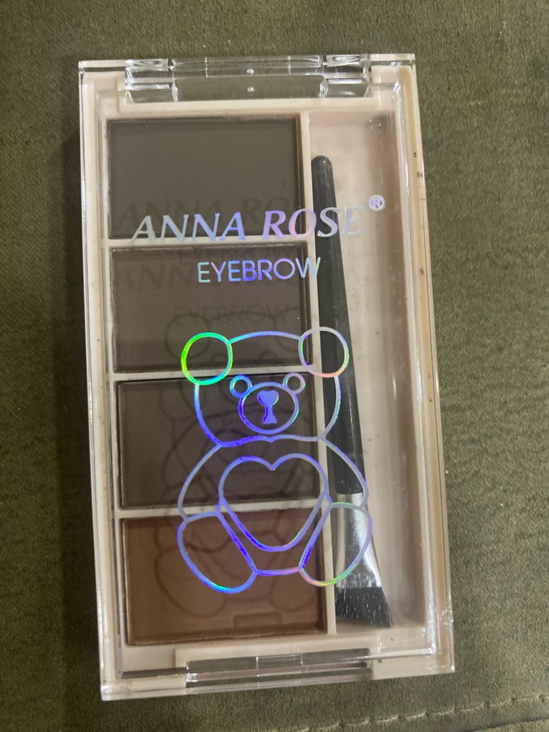 Customer photo review of A set of 4-color eyebrow powder trays with brushes in gray and brown matte tones for long-lasting color rendering, filling and s