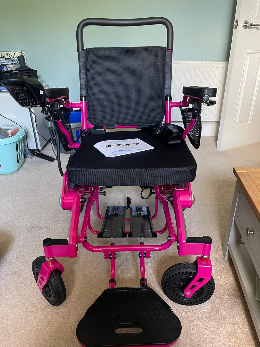 Customer photo review of Limited Edition Pink Lightweight Electric Wheelchair | Freedom Pro ST