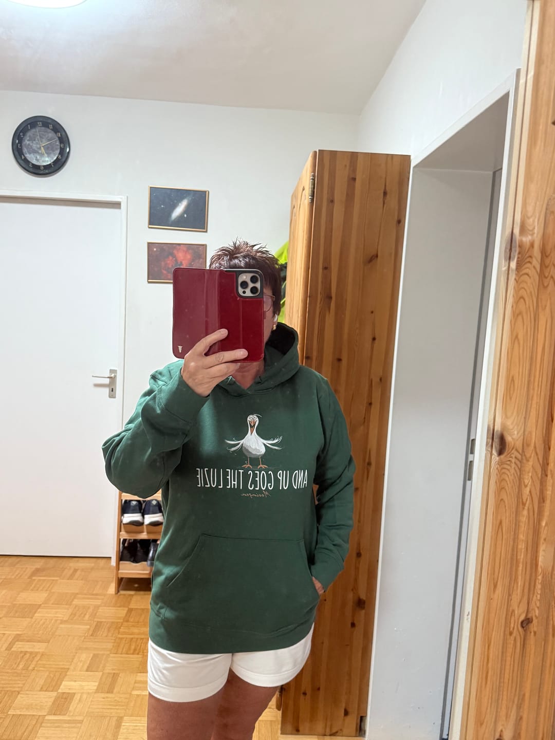 Customer photo review of And up goes the Luzie  · Unisex Bio Hoodie