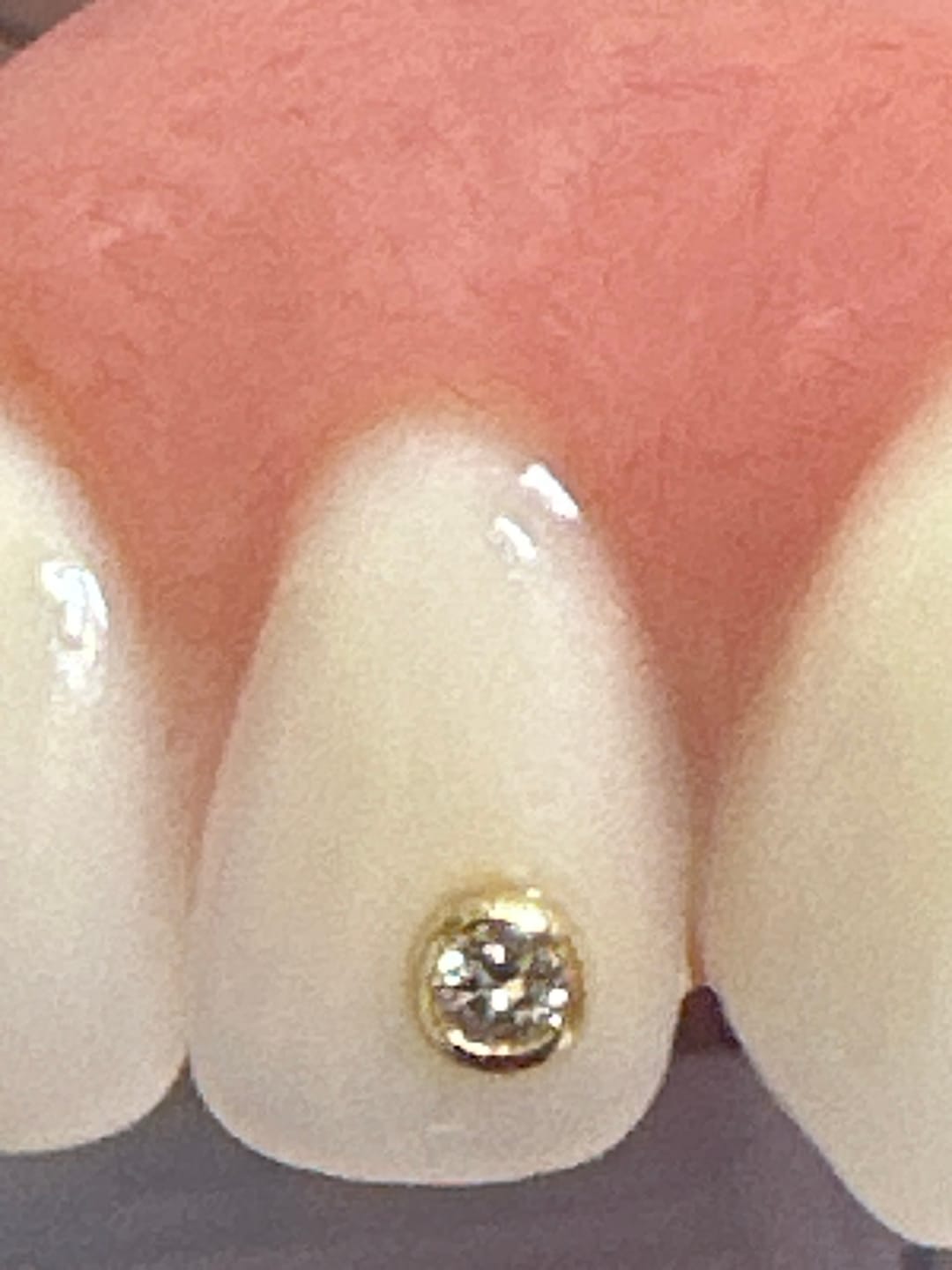 Customer photo review of Round w. Diamond 0.02ct 22-karat gold