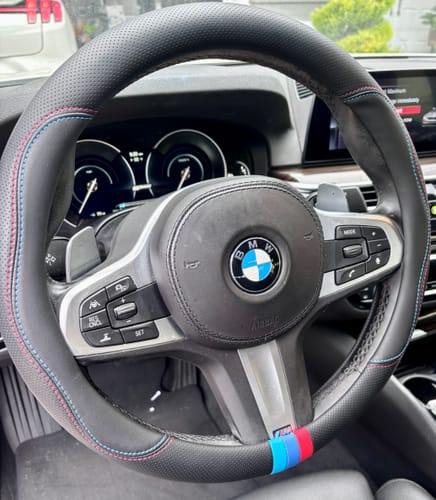 Customer photo review of Premium Leather Custom Car Steering Wheel Cover 2024 Update Version, 4 Styles, 3d Ebossing Logo, 15 inches Outer Diameter