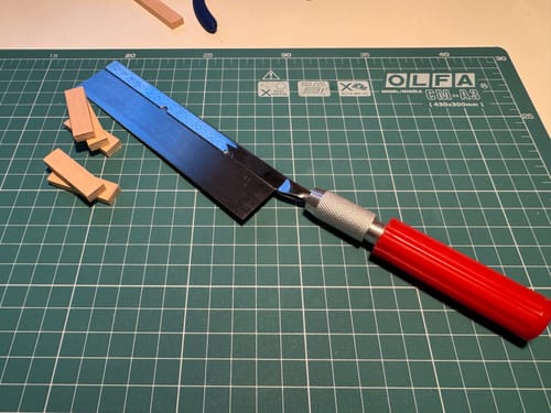 Reseña con foto de un cliente sobre Sierra 32 con mango