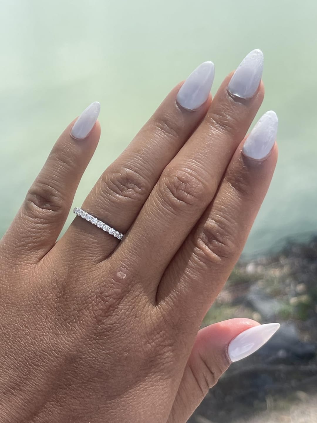 Customer photo review of S925 Half Halo Moissanite 0.5 Ct Round Cut White/Green Stone Anniversary Ring