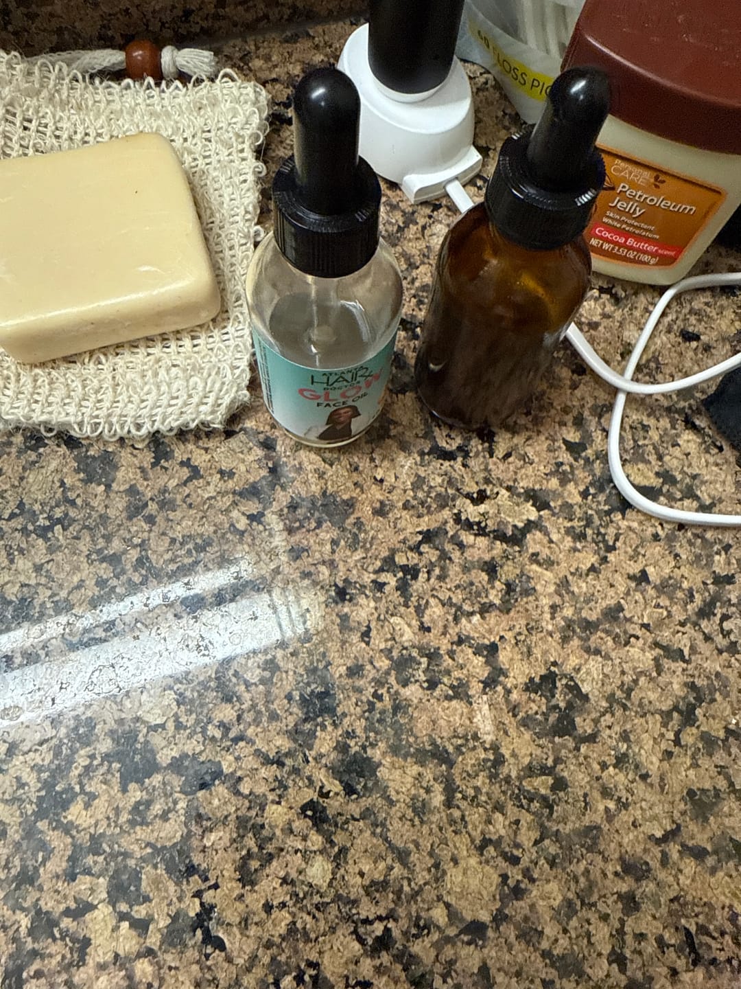 Customer photo review of 100% NATURAL HAIR GROWTH OIL - 2oz / 58ml