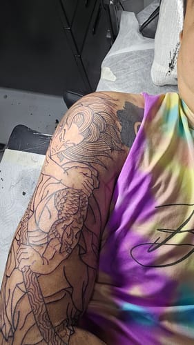 Customer photo review of Painless Tattoo Numbing Cream